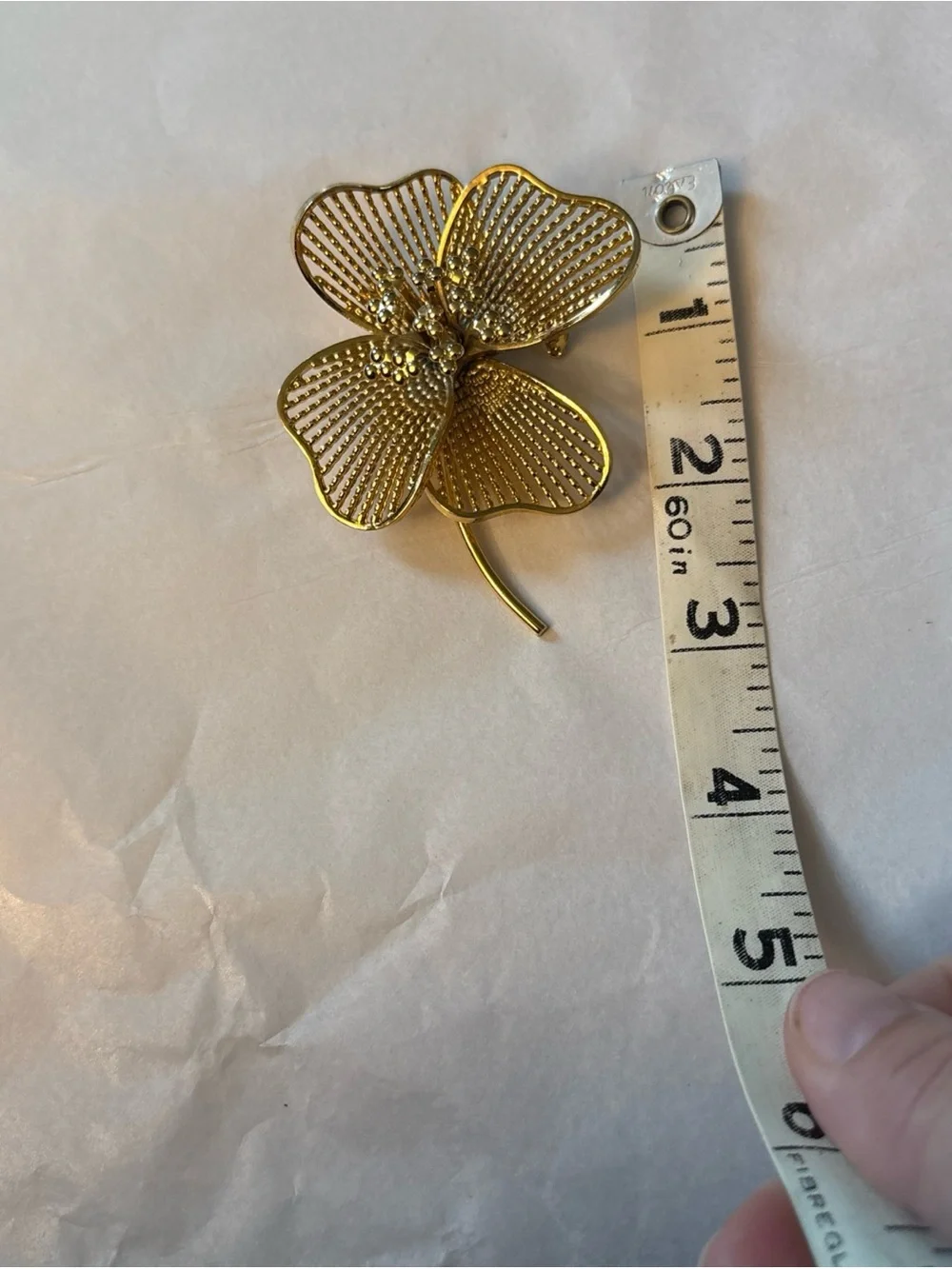 Gold Tone  4 Leaf Clover or flower brooch. Approximately 3 inches.